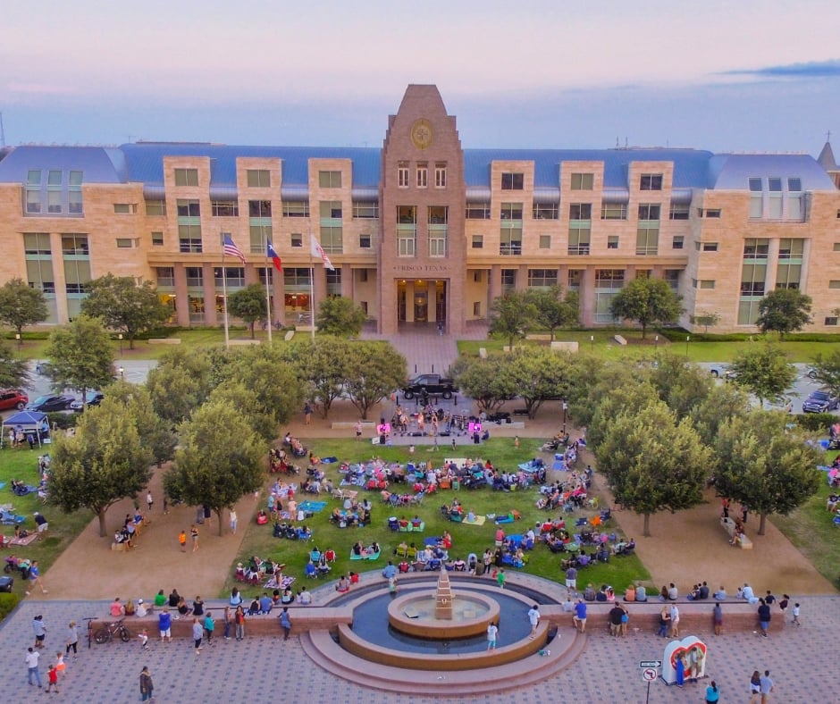 A vibrant community gathering at the Frisco Town Hall, exemplifying the collaborative spirit and local focus of Fluid IT Services.