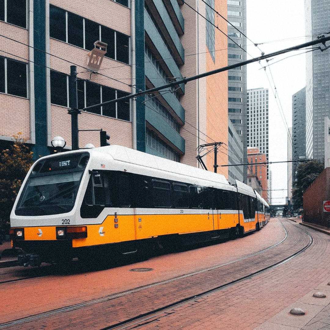 Dallas DART train, representing efficient connectivity, akin to Fluid IT's services across various industries in Dallas.