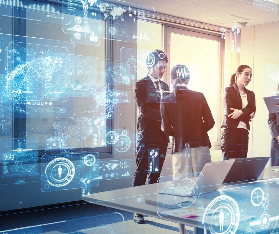 Business professionals discussing over futuristic digital interfaces, embodying the partnership approach of Fluid IT in building robust technology landscapes for clients.