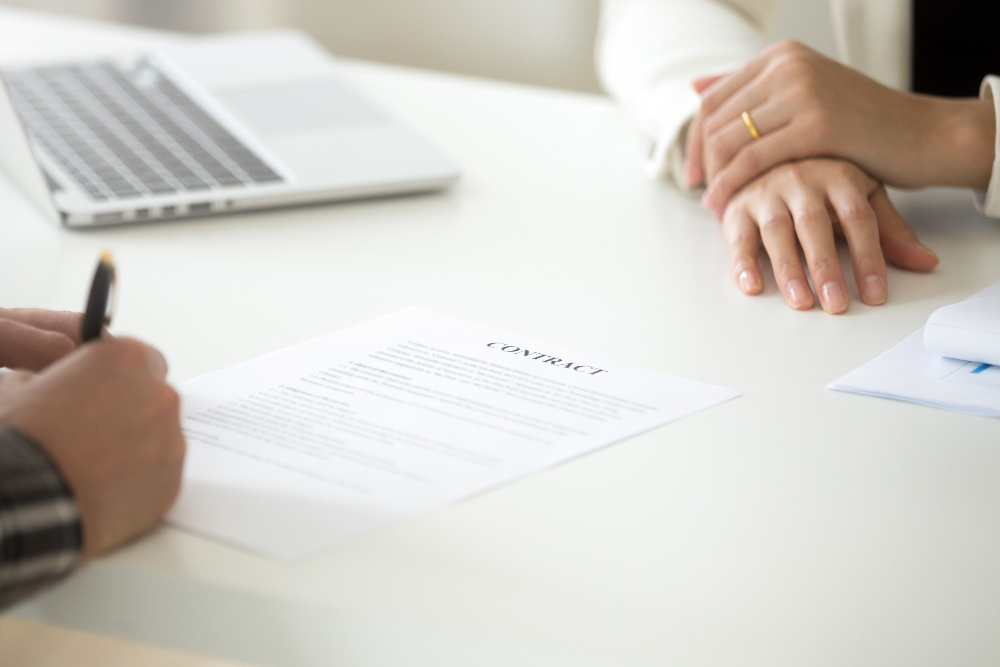 signing-business-contract-concept-man-putting-signature-legal-document